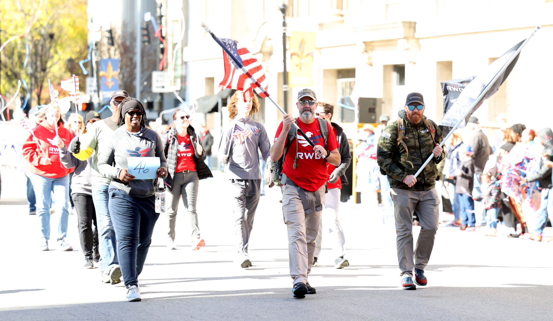 Group marches during Veterans Day Parade.JPG
